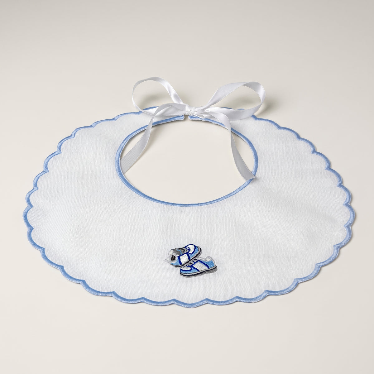 Batiste Bib with Embroidered Shoe