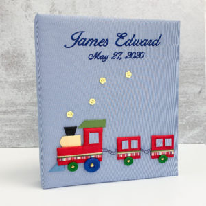 Baby Memory Book with Multicolored Train on Micro Stripe Cotton