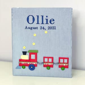 Baby Memory Book with Multicolored Train on Micro Stripe Cotton