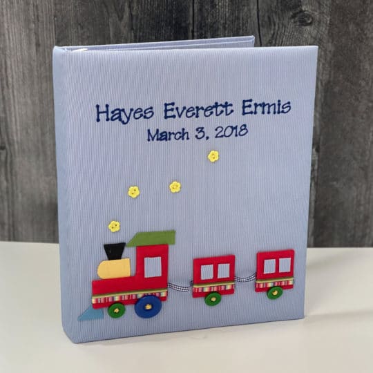 Baby Memory Book In Fine Striped Pima Cotton With Multicolored Train