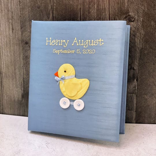 Baby Memory Book In Shantung With Baby Chick On Wheels