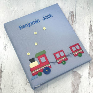 Baby Memory Book In Fine Striped Pima Cotton With Multicolored Train