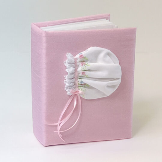 Small Hardbound Photo Album in Shantung with Swiss Batiste Baby Girl Bonnet with Flowers