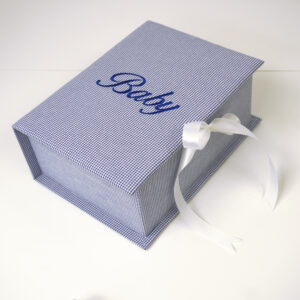 Medium royal seersucker check baby keepsake box with royal color embroidered design and white satin ribbon closure.