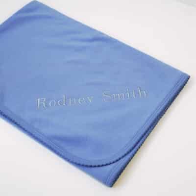 Personalized blue Pima cotton baby blanket embroidered with two names, luxury custom newborn gift