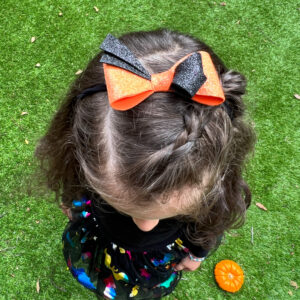 Halloween Black and Orange Felt Bow Jersey Headband lifestyle
