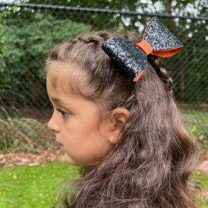 Halloween Sparkle Bow Clip lifestyle