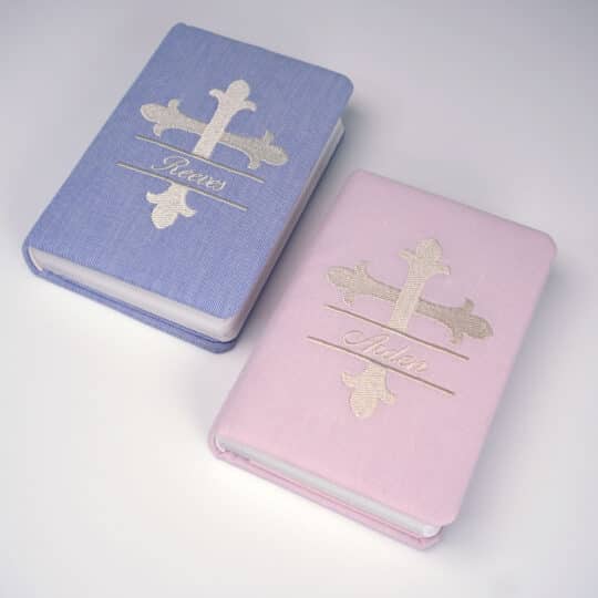 Bible covered in Micro Stripe Cotton with Large Embroidered Cross