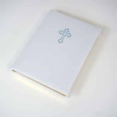 Pique fabric wrapped Catholic Bible with baby blue clover cross