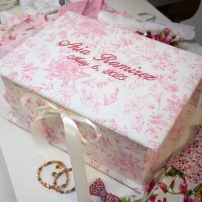 Medium baby keepsake box in Beary Blossoms Toile print, wrapped in pink floral cotton fabric, shown closed with a bow accent.