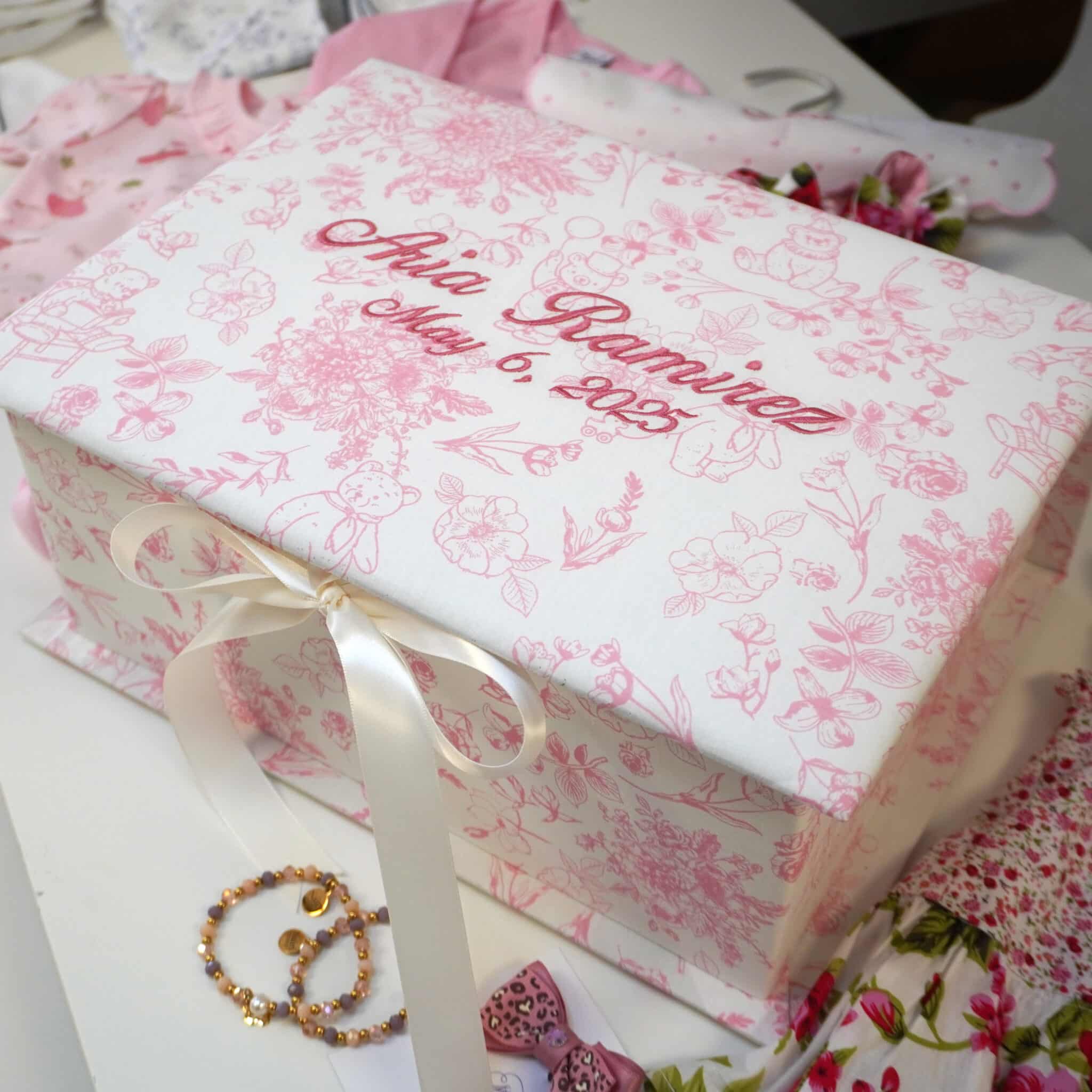 Medium baby keepsake box in Beary Blossoms Toile print, wrapped in pink floral cotton fabric, shown closed with a bow accent.